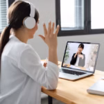 medium-shot-smiley-woman-video-call_23-2148924732